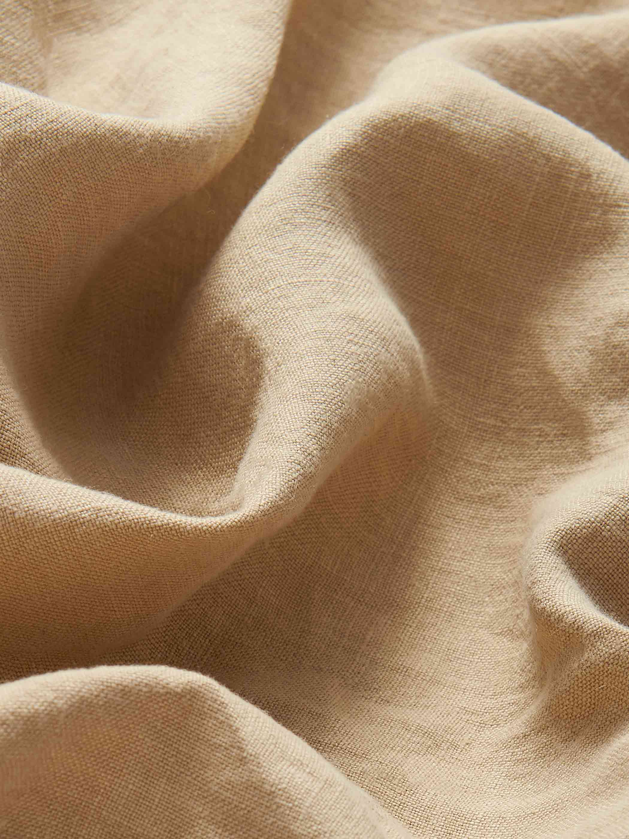 Detailed view of 100% linen fabric of Men's Coconut Eleuthera Linen Trousers