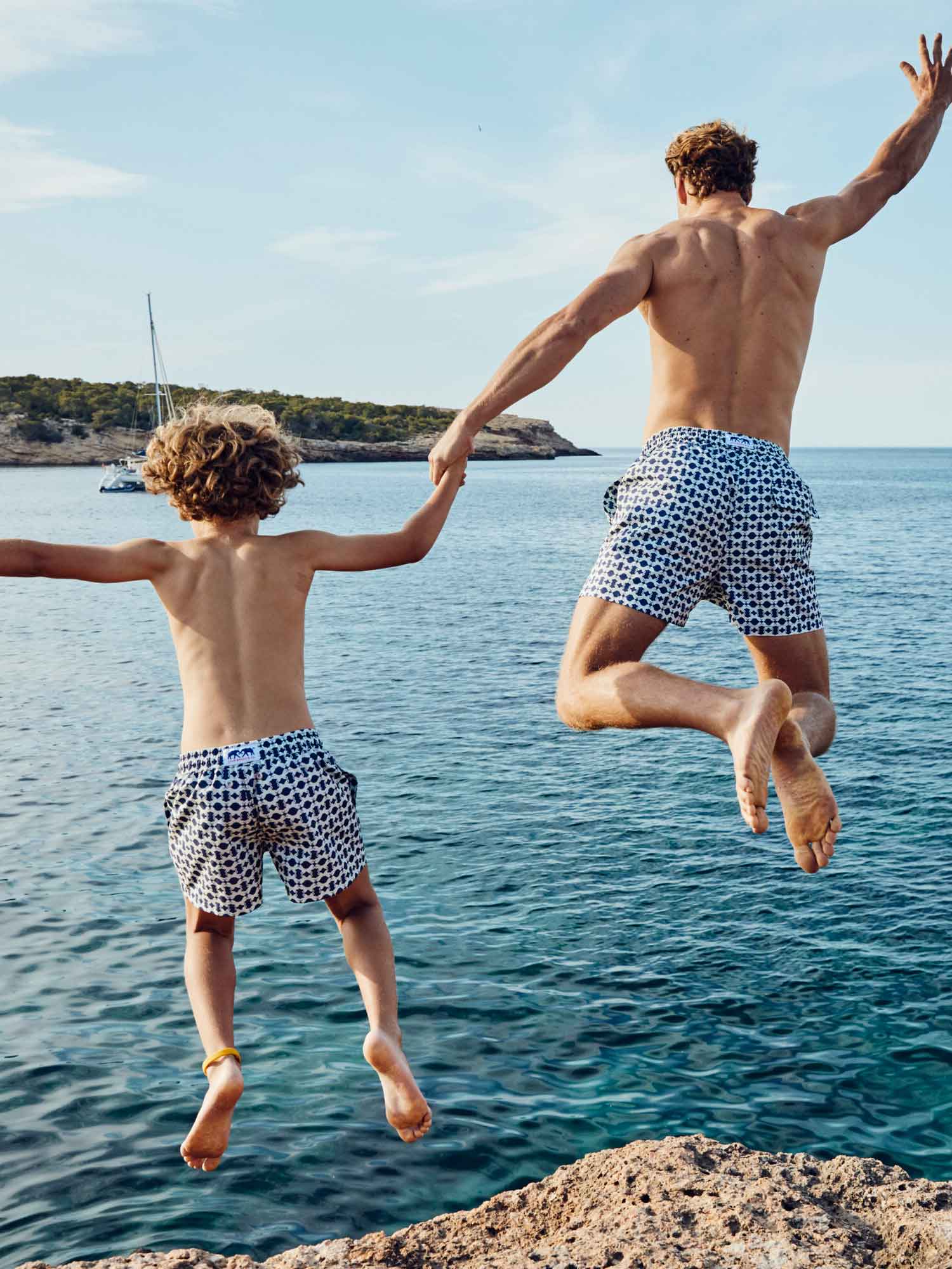 father and son wear love brand matching mens linen shorts