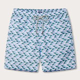 Men's swim shorts with a patterned design of emerald and white manta rays on quick-dry fabric.