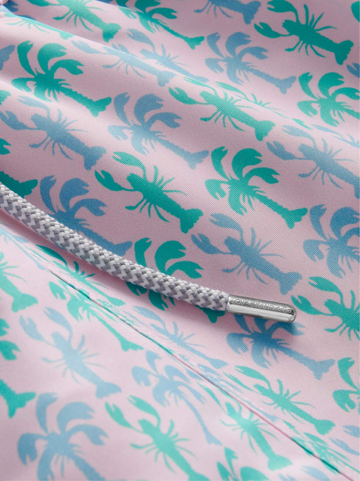 Pink fabric with green and blue lobster pattern and drawstring