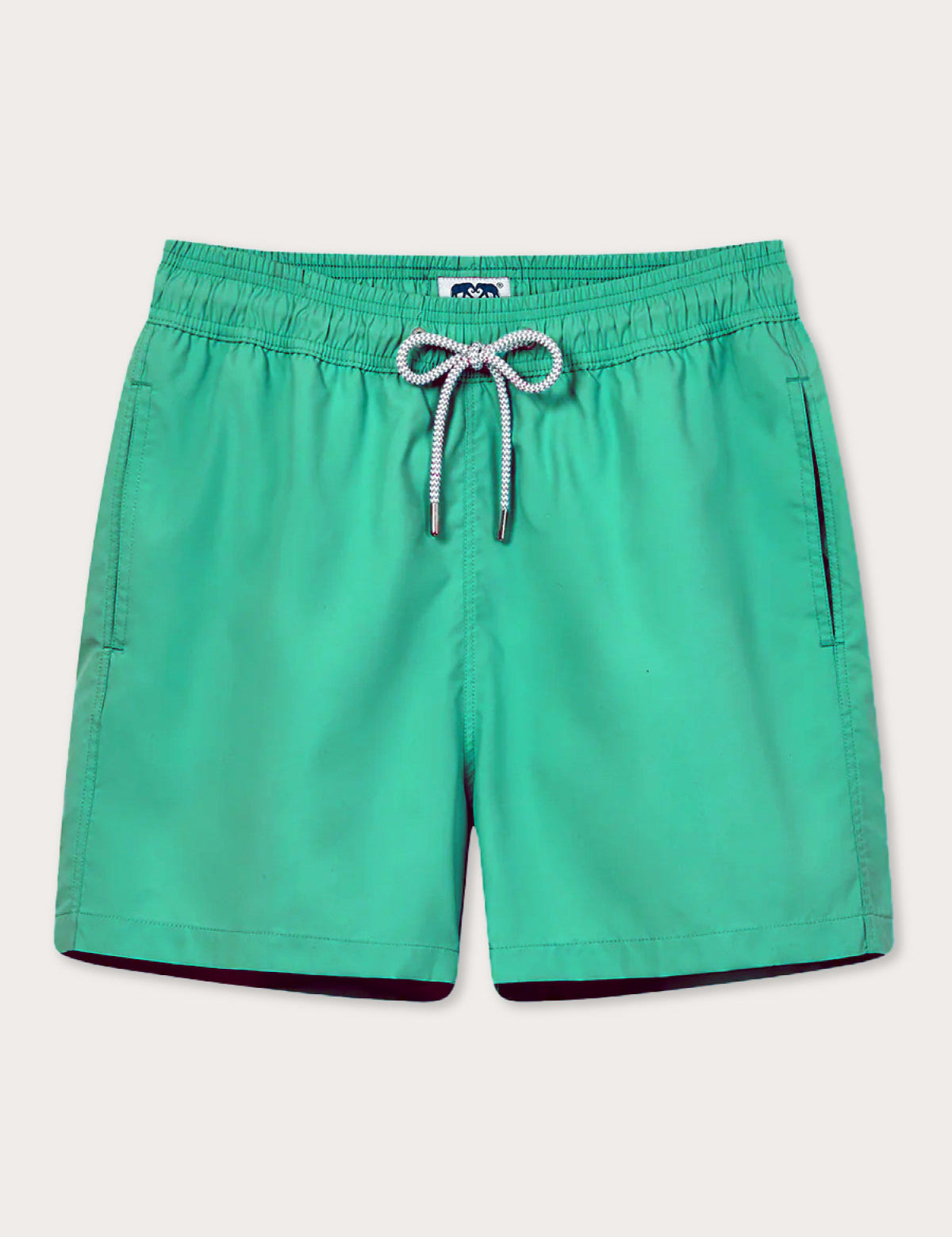 Men's Sicilian Green Staniel Swim Shorts made from 100% recycled, quick-drying material. Plain swim shorts featuring an adjustable waistband and vibrant green color inspired by Sicily's natural beauty.