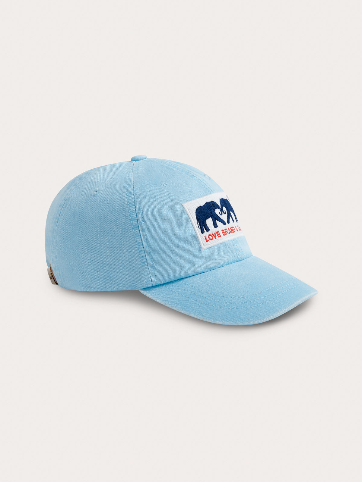 Light blue cap with a logo on a white background