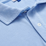 Close-up of Men's Sky Blue Pensacola Polo Shirt displaying the fabric texture and collar detail.