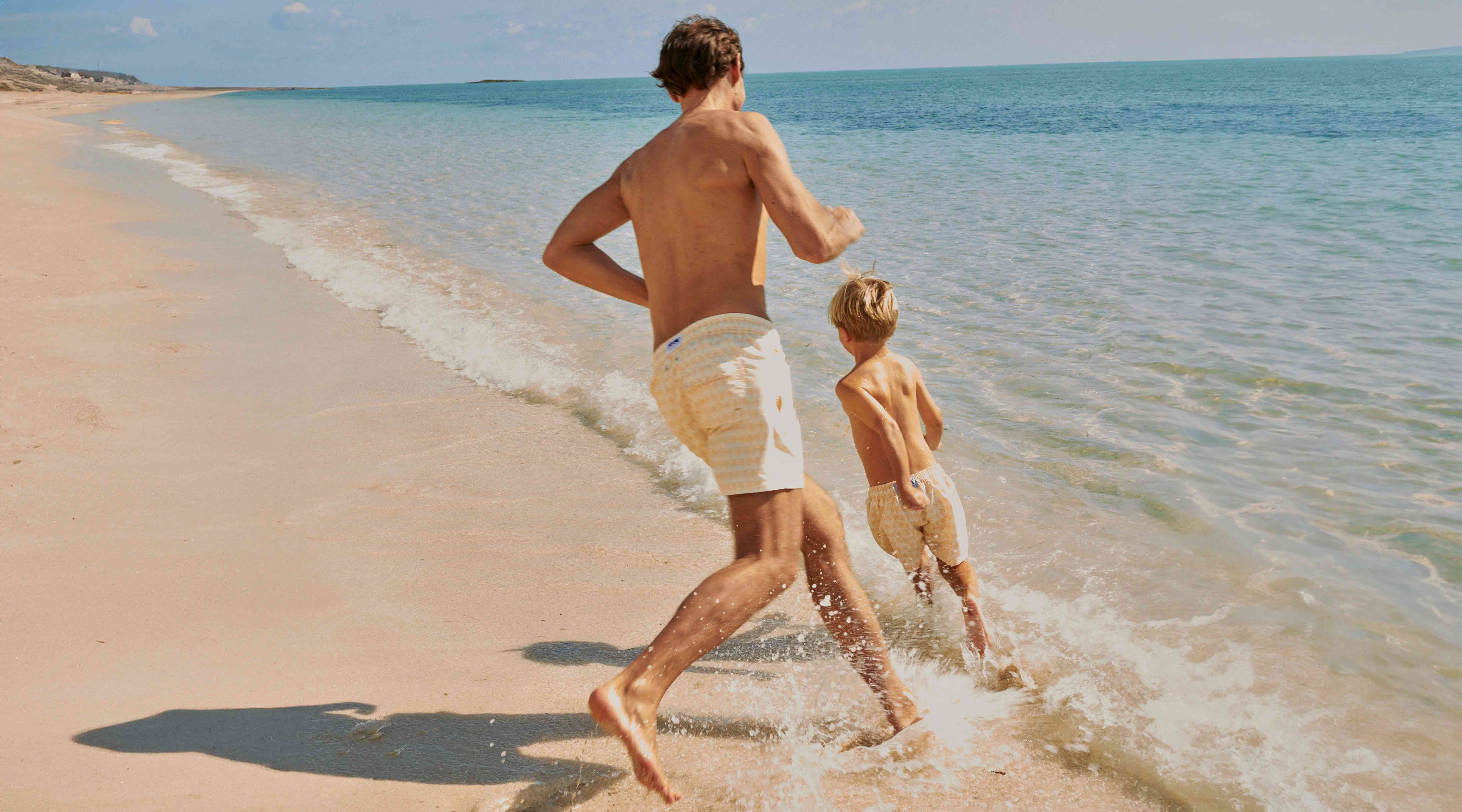 Father and son wear love brand & co. matching sustainable swimwear