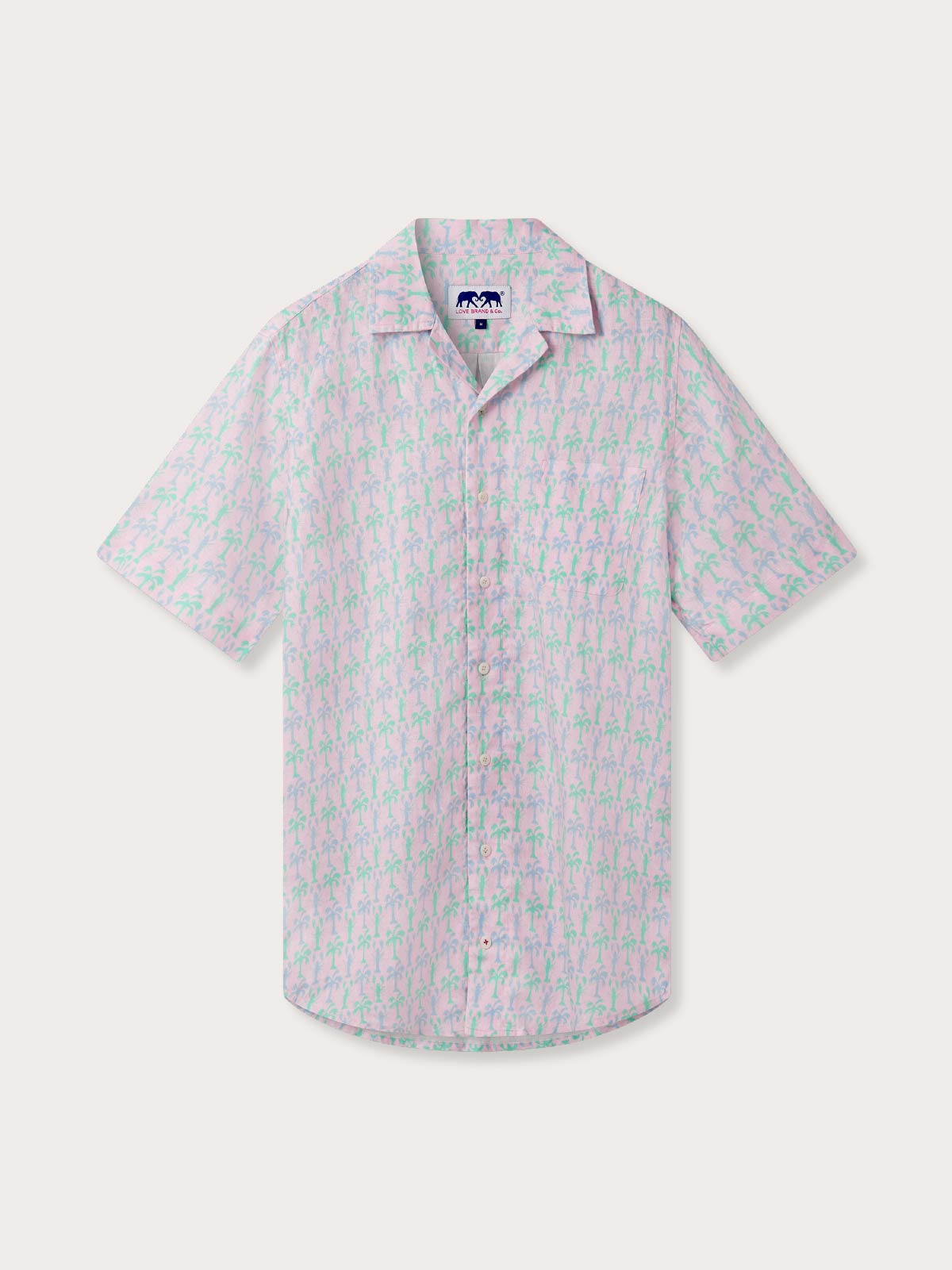 Short-sleeve shirt with a subtle tropical pattern on a white background