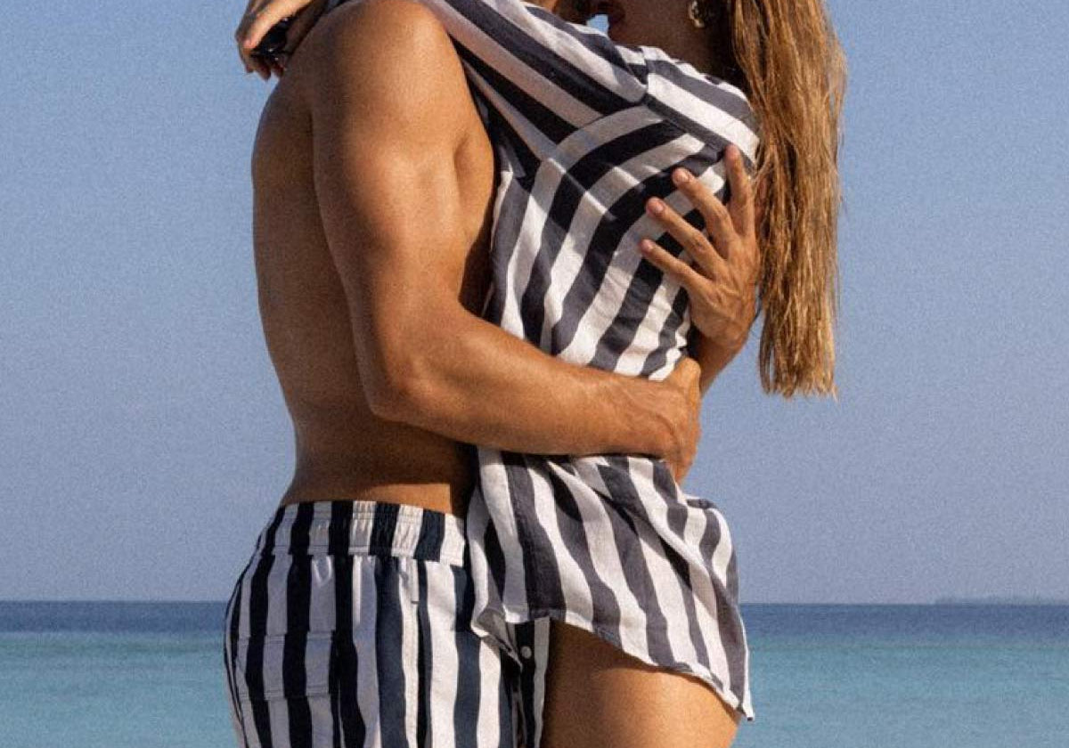 man and woman in beachwear by mens swimsuit brands love brand & co.