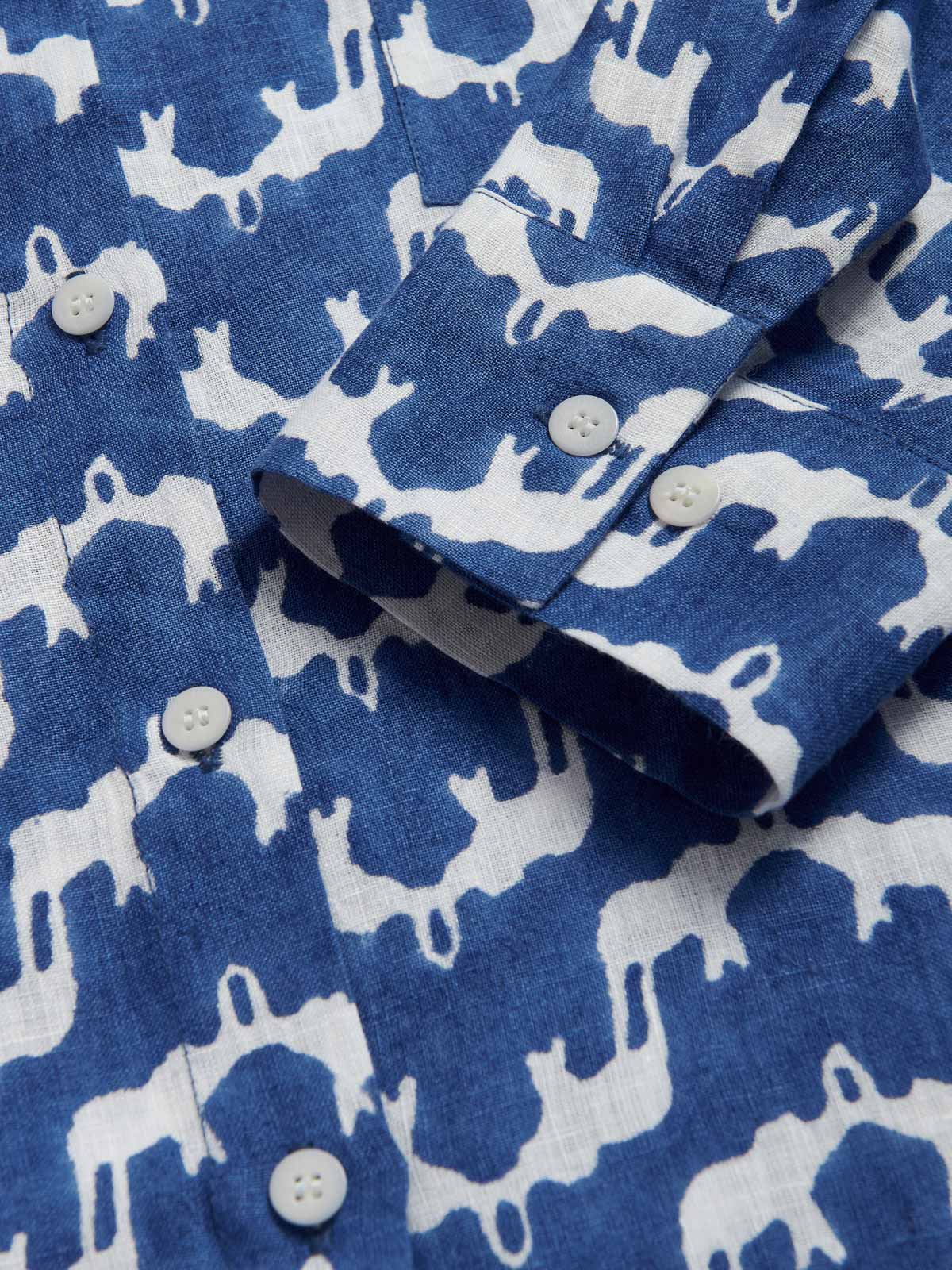 Womens Elephant Palace Blue Sapodilla Linen Shirt Dress. View of the long sleeve block printed cuffs and corozo nut buttons.