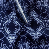 Men's Going Gecko Staniel Swim Shorts featuring an intricate line drawing print inspired by the endangered Union Island Gecko, created in partnership with the St. Vincent and the Grenadines Environment Fund.