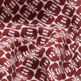 Close-up view of men's Joulter Linen Shorts featuring a pattern of dark burgundy elephants on a white background.