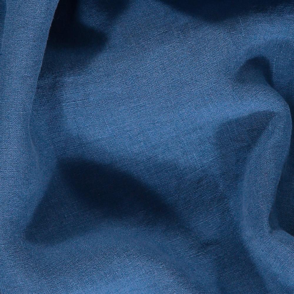 Close-up view of blue chambray fabric from Men's Chambray Abaco Linen Shirt.