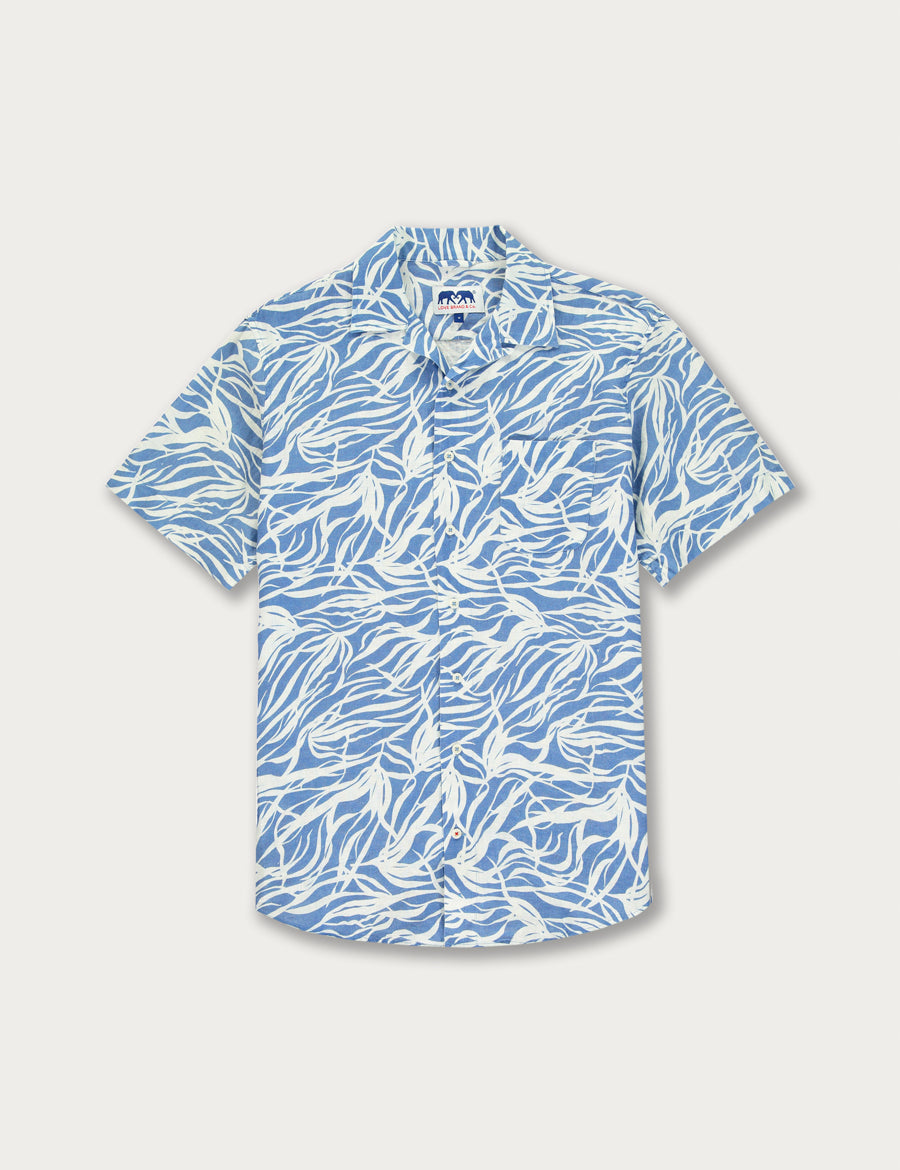 Men's Kelp Arawak Linen Shirt in sea blue and white. Men's linen shirt with an elegant print inspired by underwater kelp forests.