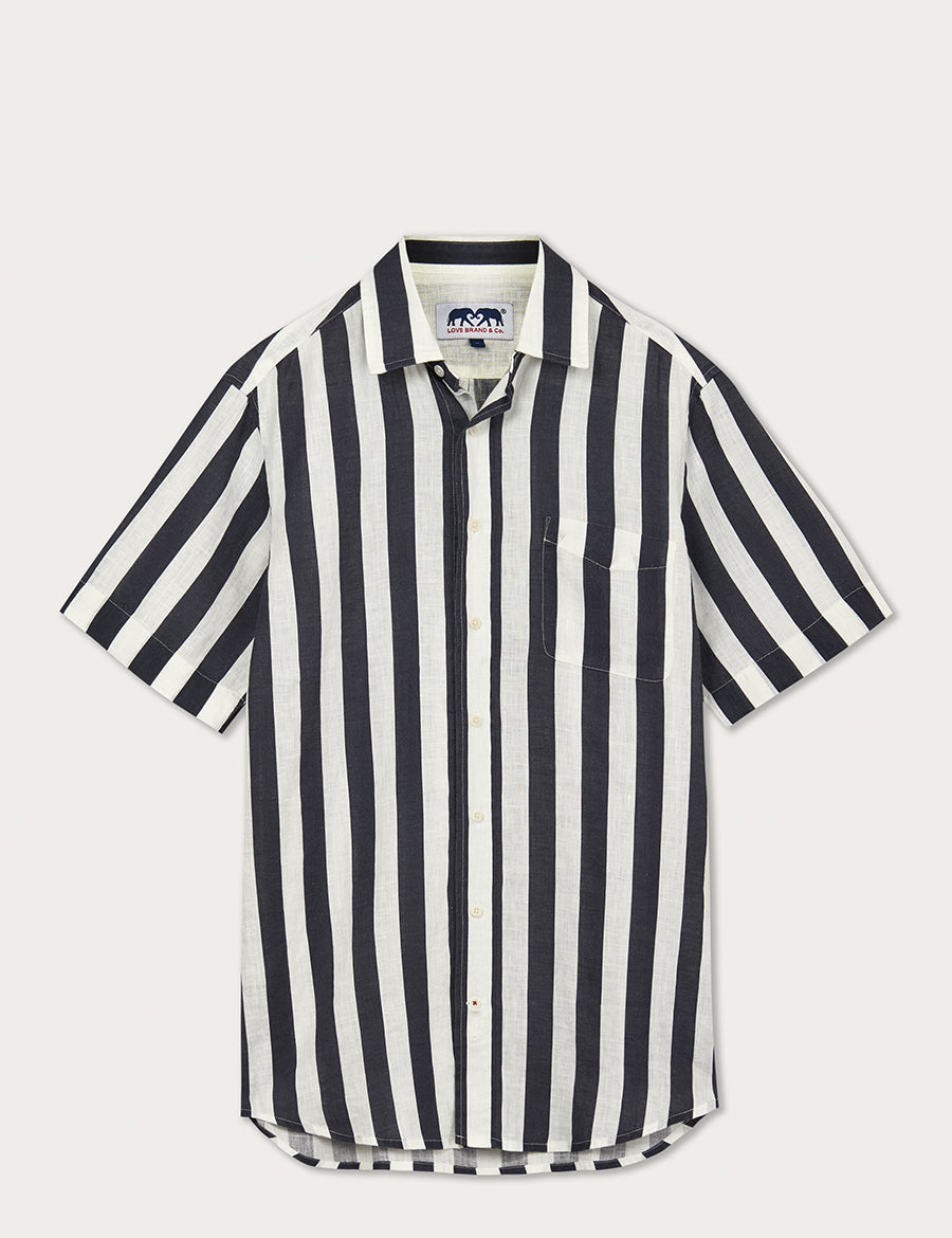 Men's Navy Candy Stripe Manjack Linen Shirt with short sleeves and a 1950s-style navy blue and white striped pattern. Men's linen shirt oozing old money style.