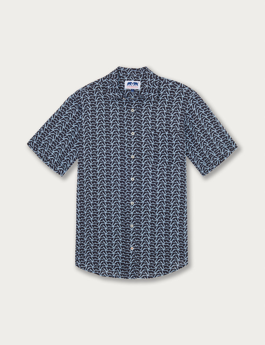 Men's navy blue linen shirt with a white starfish pattern. Men's linen shirt with short sleeve, button-up front.