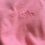 Close-up of the Men's Watermelon Lockhart T-Shirt in bright pink-red hue, showcasing intricate embroidered design.