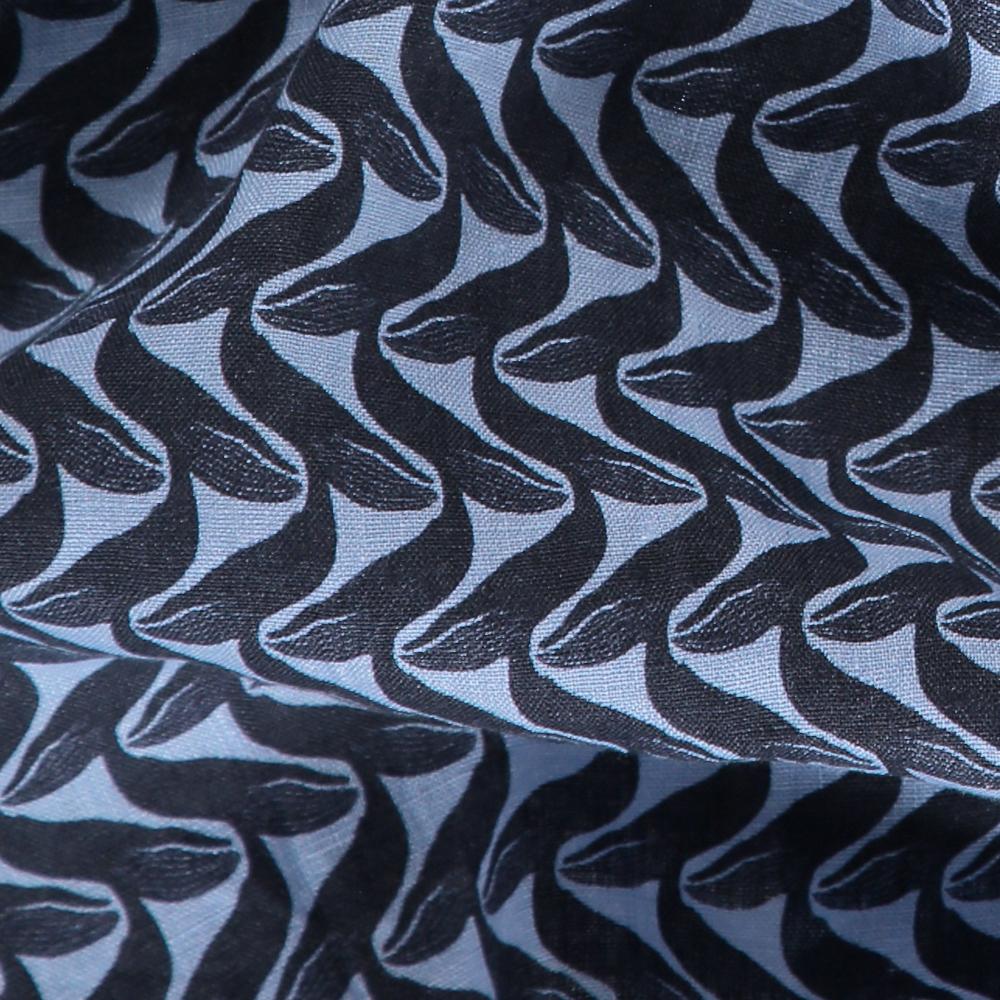 Close-up of the pattern on the Men's Whale of a Time Abaco Linen Shirt, featuring interlocking hidden whale motifs on soft, breathable linen fabric.