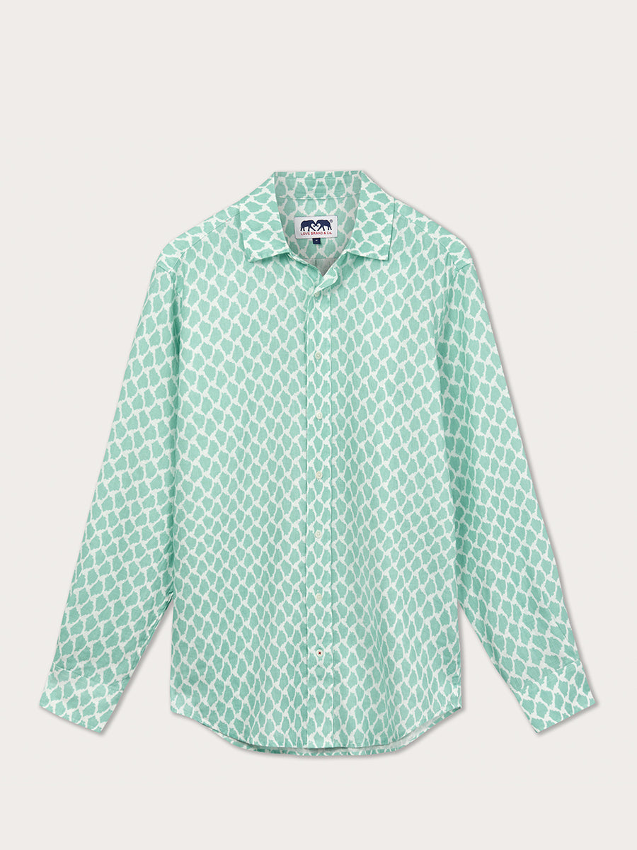 A long-sleeved, green linen shirt with a geometric conch shell pattern.
