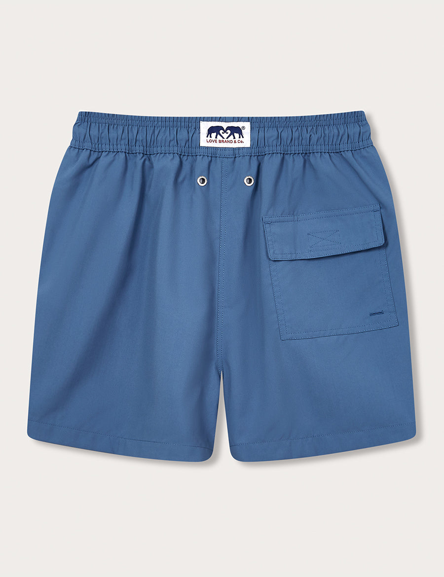 Men's Chambray Staniel Swim Shorts in deep Mediterranean blue, crafted from 100% recycled, quick-drying fabric with an elastic waistband and a side pocket.