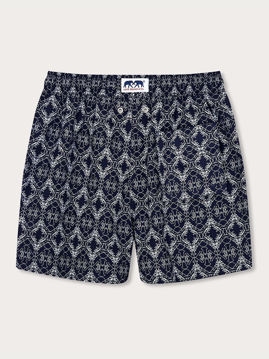 Men's Going Gecko Staniel Swim Shorts with intricate line drawing print inspired by the Union Island Gecko conservation efforts.