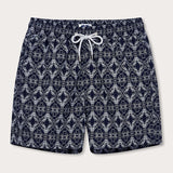 Men's Going Gecko Staniel Swim Shorts with intricate pattern, inspired by the Union Island Gecko conservation efforts.