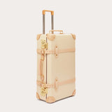 Globe-Trotter Safari 26" Trolley Case, beige color with tan leather straps, sturdy handle, and gold latches, designed in collaboration with LOVE BRAND & Co., featuring the 'Elephant Palace' print lining.