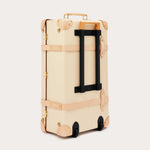 Globe-Trotter Safari 26" Trolley Case in cream with tan leather straps and gold hardware, designed by LOVE BRAND & Co. featuring an 'Elephant Palace' print lining.