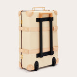 Globe-Trotter Safari 20" Trolley Case in cream with tan leather details and black handle, designed in collaboration with LOVE BRAND & Co.