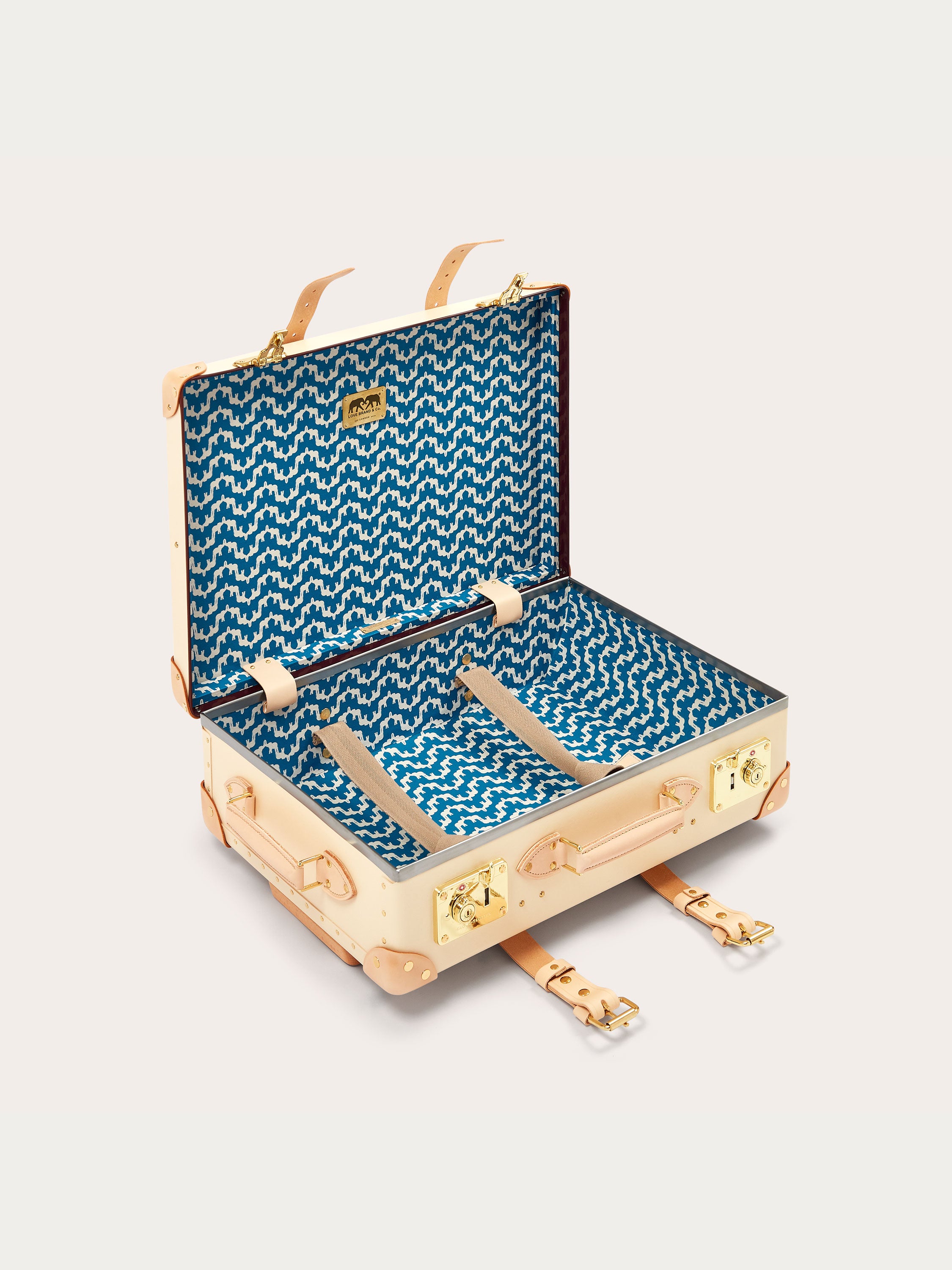 Globe-Trotter Safari 20" Trolley Case with LOVE BRAND & Co.'s 'Elephant Palace' print lining. Trolley case featuring leather straps and gold hardware.